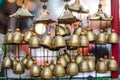 Small brass bells made as souvenirs are sold in the old Chinese market, Ban Chak Ngaew