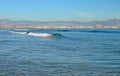 A Small Breaking Wave In A Flat Sea Royalty Free Stock Photo