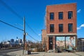 Small brick residential building on Carroll St in Brooklyn, NYC, showing the skyline of Lower Manhattan on the left Royalty Free Stock Photo