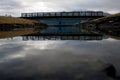 Small Bridge Reflected in Water Royalty Free Stock Photo