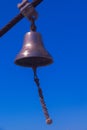 Small bronze bell on a sailing ship