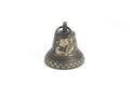 Small bronze bell on white