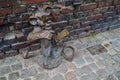 A small bronze sculpture on the street of Gdansk. Poland.