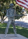 Small bronze statue of Sargent Manuel Gonzales on the Courthouse lawn in Fort Davis.