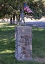 Small bronze statue of Sargent Manuel Gonzales on the Courthouse lawn in Fort Davis.