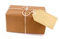 Small brown parcel package, manila label Royalty Free Stock Photo