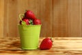 Small bucket with a red, juicy klubnika Royalty Free Stock Photo