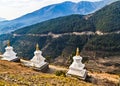 Small buddhist tower-shaped Stupa on background of Himalaya mountains in Bhutan, Asia Royalty Free Stock Photo