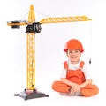 Small builder and crane on white background Royalty Free Stock Photo
