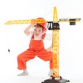 Small builder and crane on white background Royalty Free Stock Photo