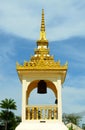 A small building with a bell on the territory of Wat Mongkol Nimit