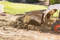 Tractor Bulldozer Breaking Ground Preparing For Pool Royalty Free Stock Photo