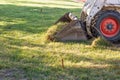 Small Bulldozer Removing Grass From Yard Preparing For Pool Installation Royalty Free Stock Photo