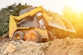 Small bulldozer. Sunny Royalty Free Stock Photo