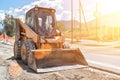 Small bulldozer. Sunny Royalty Free Stock Photo