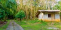 Small bungalow at the coconut palm trees plantation Royalty Free Stock Photo