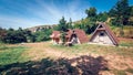 Small bungalows in the mountain. Old small hut in mountains. Royalty Free Stock Photo