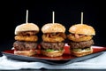 Sliders beef tall mini burgers sharing food Royalty Free Stock Photo