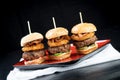Sliders beef tall mini burgers sharing food Royalty Free Stock Photo
