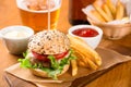 Small burger snack with fries and beer Royalty Free Stock Photo