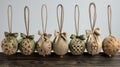 small burlap christmas ornaments with lace and ribbon, in the style of symmetrical asymmetry, aykut aydogdu, eye