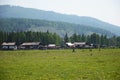 Small Buryat village in the foothill of East Sayan Mountains Royalty Free Stock Photo