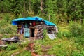 Small Buryat winter hut hunting in mountain taiga Royalty Free Stock Photo