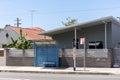 The Small bus stop in rural town with blue sky day. Royalty Free Stock Photo