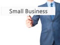 Small Business - Businessman hand holding sign Royalty Free Stock Photo