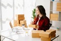 Small business entrepreneur SME freelance woman working at office, BOX,tablet and laptop online, marketing, packaging, delivery, Royalty Free Stock Photo