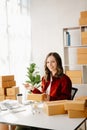 Small business entrepreneur SME freelance woman working at office, BOX,tablet and laptop online, marketing, packaging, delivery, Royalty Free Stock Photo