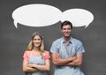Small business owner couple with speech bubbles standing against grey background Royalty Free Stock Photo