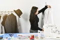 Small business owner, Dressmaker designer making pattern and measure garment, Asian fashion designer. Royalty Free Stock Photo