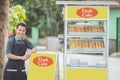 Small business owner and his food stall Royalty Free Stock Photo