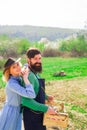 Small business owner selling organic fruits and vegetables. Image of two happy farmers with instruments. A farmer and Royalty Free Stock Photo