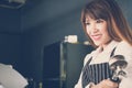 Small business owner standing at counter in coffee shop. female Royalty Free Stock Photo