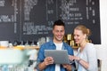 Small business owners in coffee shop Royalty Free Stock Photo