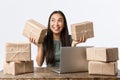 Small business owners, startup and e-commerce concept. Successful happy asian female rejoicing as receive lots of orders