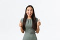 Small business owners, women entrepreneurs concept. Excited smiling businesswoman showing thumbs-up, having great start