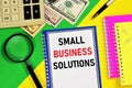 Small business solutions. Text label in the planning Notepad. Royalty Free Stock Photo