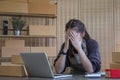 Small Business, Startup SME, Owner Entrepreneurs. Asian woman with unsuccess business online shopping crying and serious