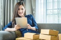 Small business woman preparing to send out her product in boxes Royalty Free Stock Photo