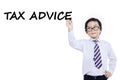 Small businessman writes tax advice Royalty Free Stock Photo