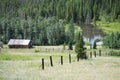 Small Cabin next to a beaver pond in mountains