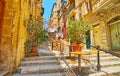 The small cafe in narrow descent, Valletta, Malta