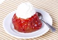 Small cake with cherry glaze and cream Royalty Free Stock Photo