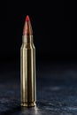 Small-caliber tracer cartridges on a dark Royalty Free Stock Photo