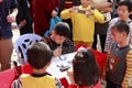 Small calligrapher zhanzhenhua performing chinese calligraphy