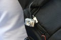 Small camera in the bag Royalty Free Stock Photo