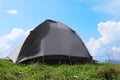 Small camping tent in mountains Royalty Free Stock Photo